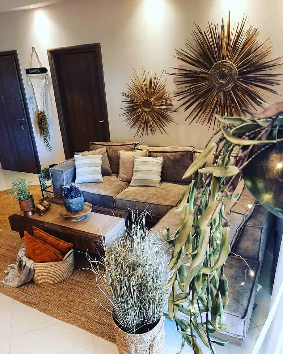 Living room with sunburst wall decor and earthy tones