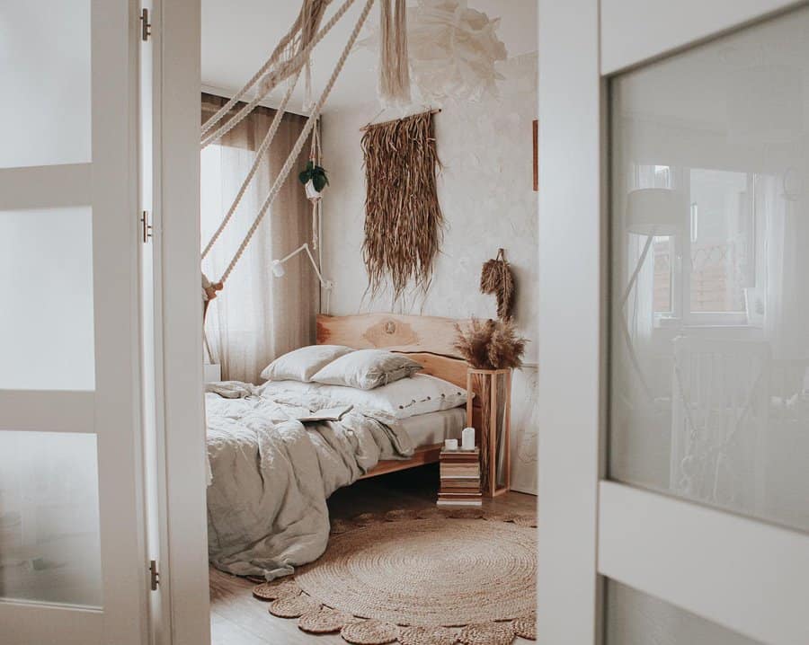 Earthy Boho Zen bedroom with natural wood, woven textures, soft linens, and organic decor for a peaceful, grounding retreat