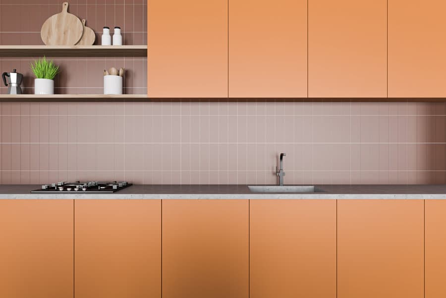 Matte orange kitchen cabinet