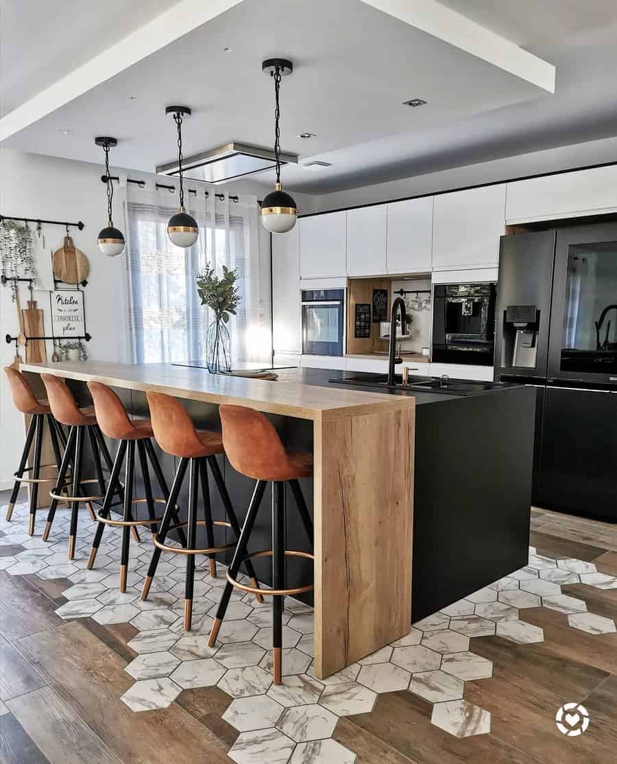 Modern kitchen with tan stools and unique tiled floor