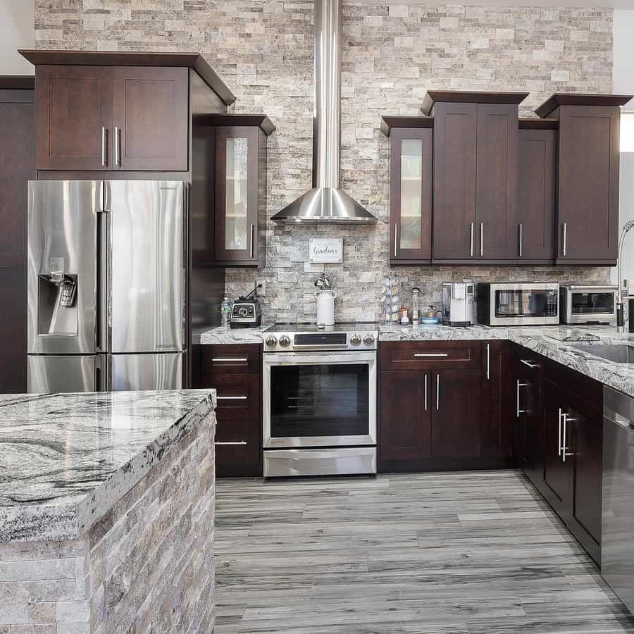 Contemporary kitchen with stone backsplash