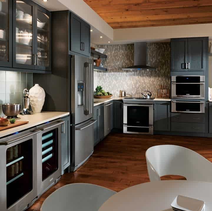 Sophisticated kitchen with metallic backsplash