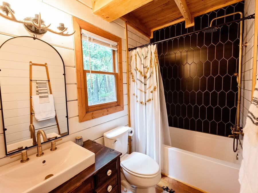 Rustic bathroom with copper fixtures 