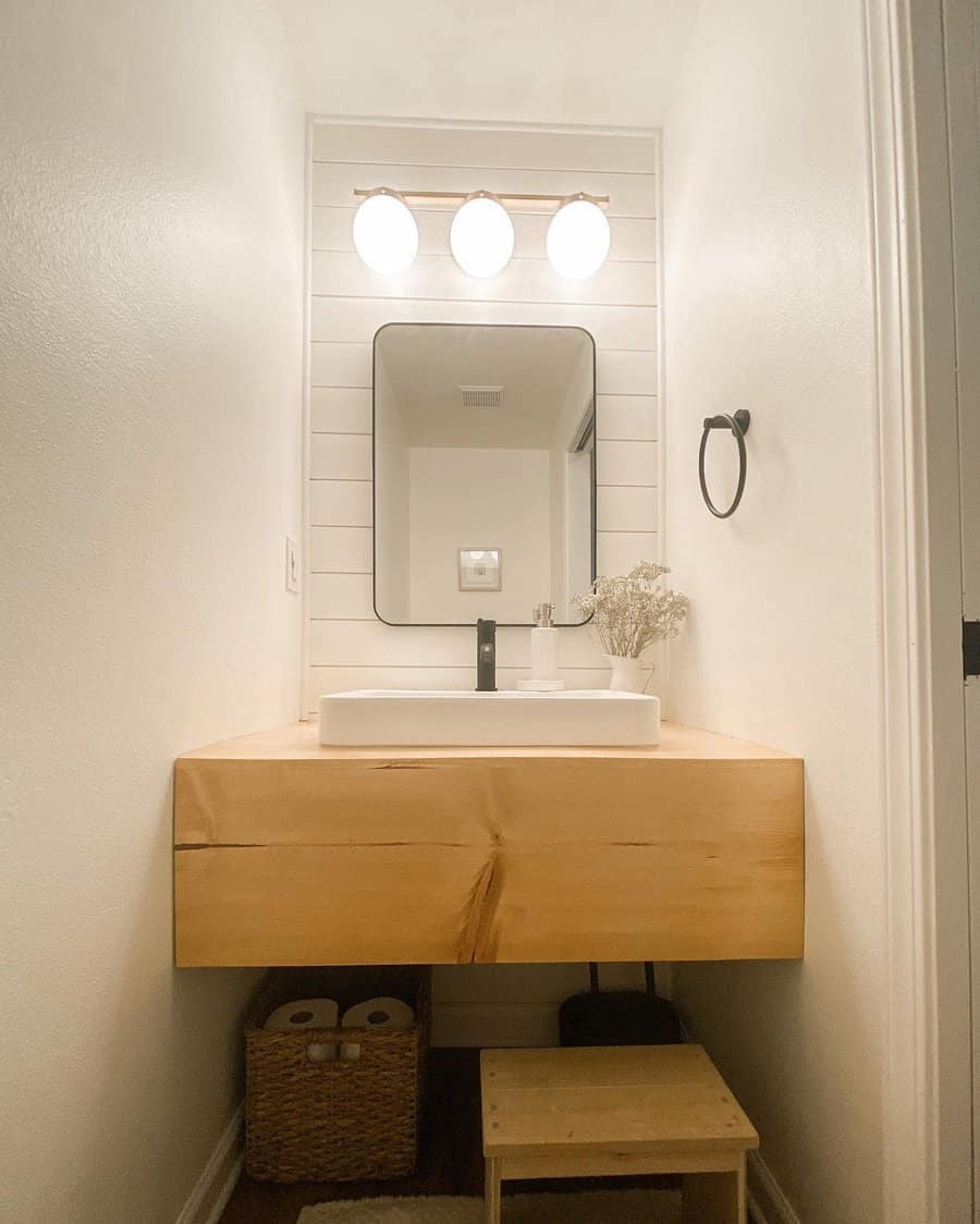 Half bathroom with recessed vanity