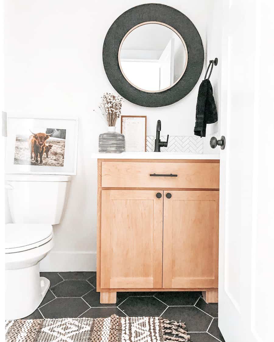 Half bathroom with black fixtures