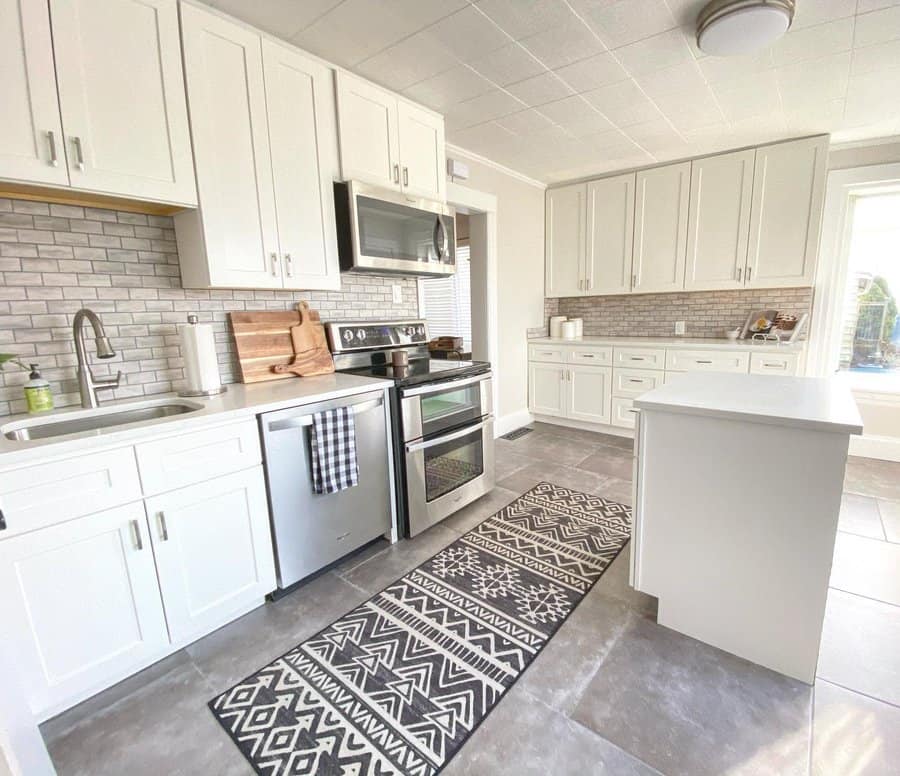 small kitchen with runner rug