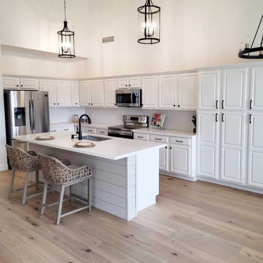 White kitchen with black fixtures 