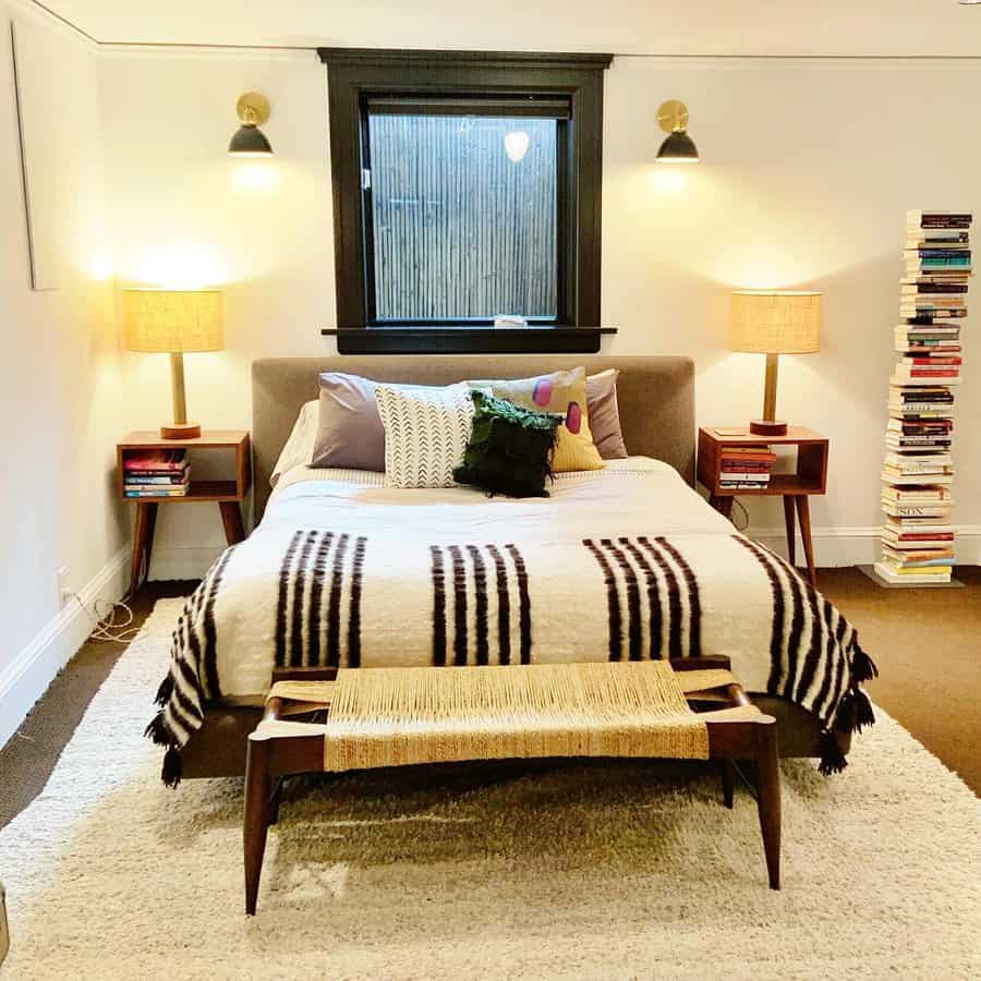 Warm bedroom with bookshelf and cozy lighting