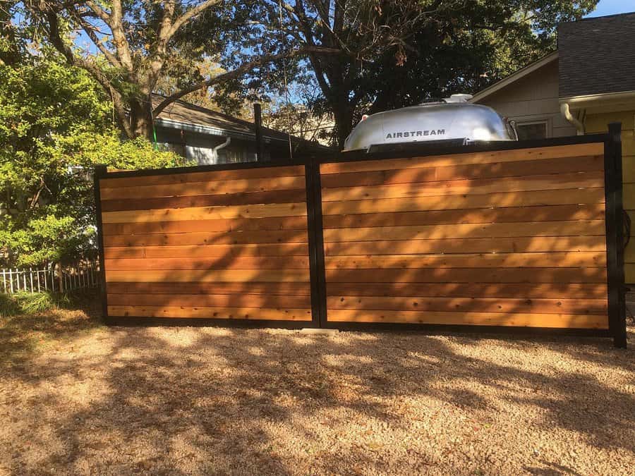 Wooden fence with metal frame