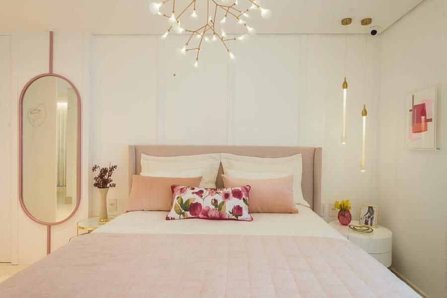 Modern pink and white bedroom with chic decor