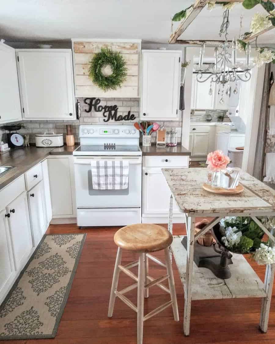 farmhouse kitchen with distressed furniture