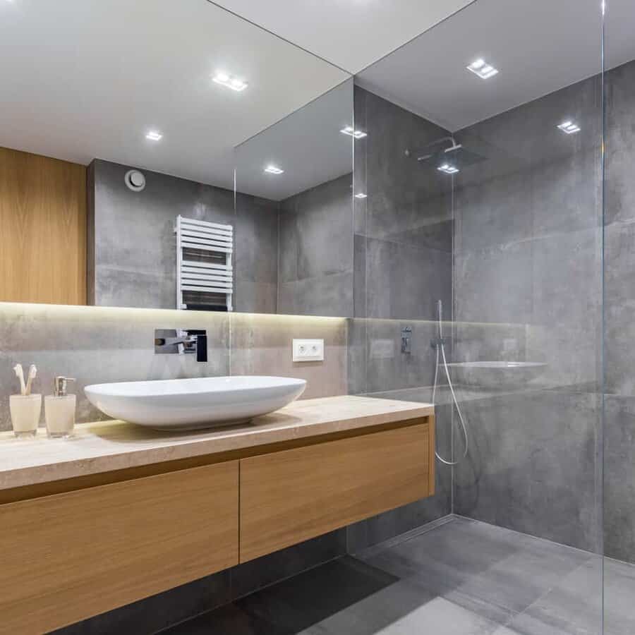 Sleek bathroom with wood accents and basin