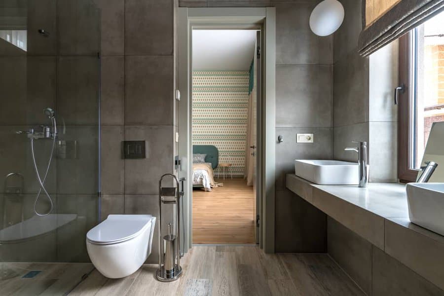 Modern grey bathroom with glass shower