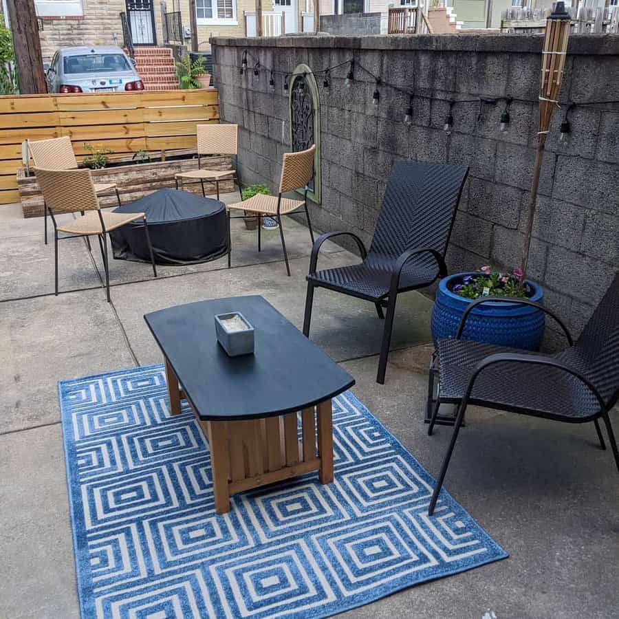 Backyard with outdoor throw rug