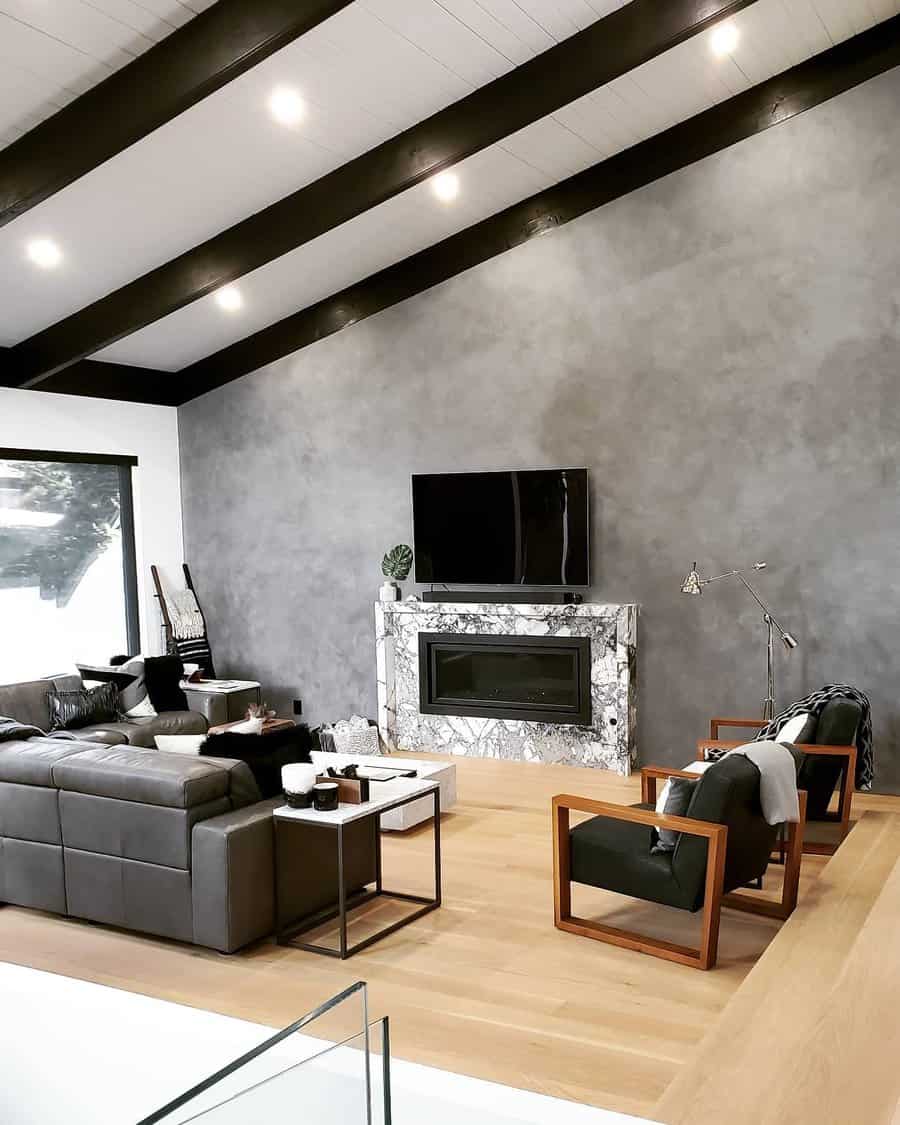 Sleek living room with marble fireplace and gray walls