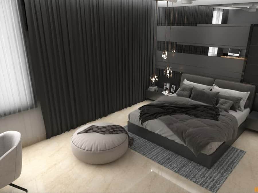 black bedroom with beige flooring 