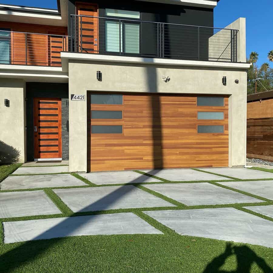 Modern home with stylish wood garage door