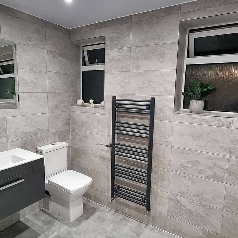 contemporary grey bathroom with marble tiles