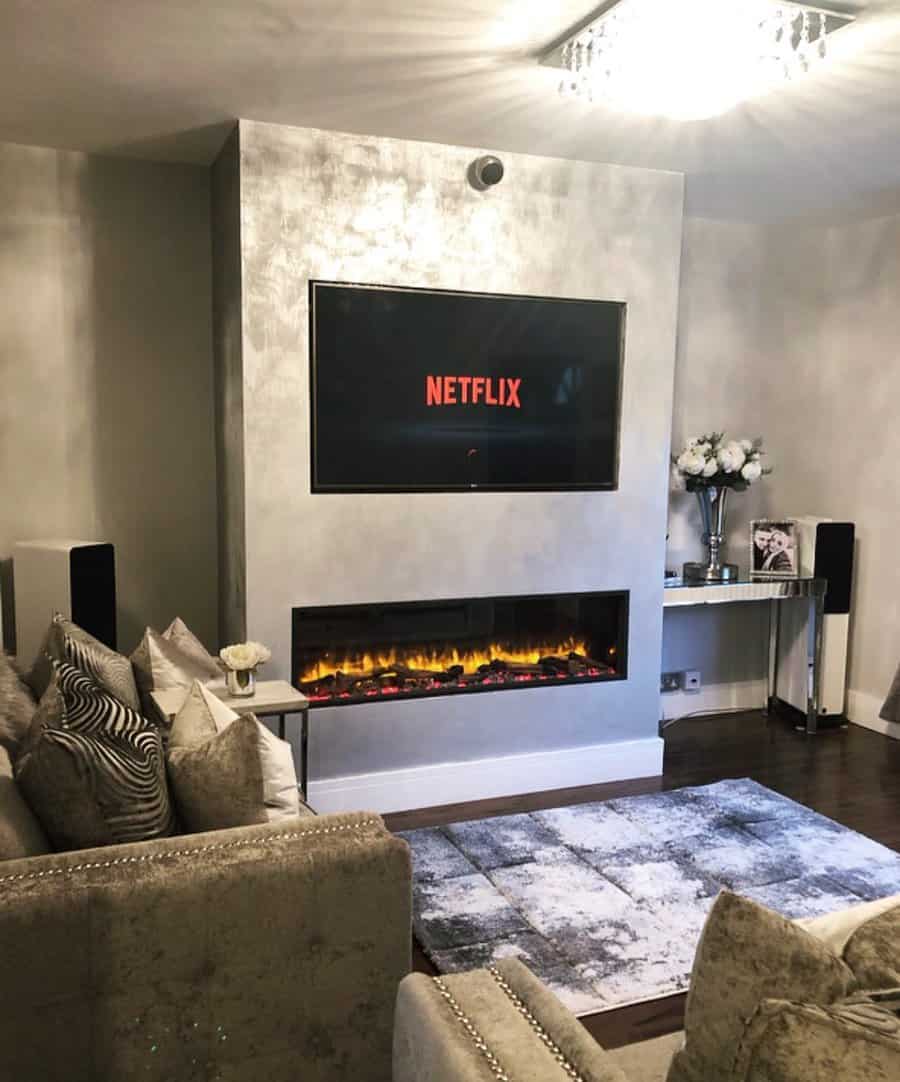 Modern living room with electric fireplace and Netflix on TV