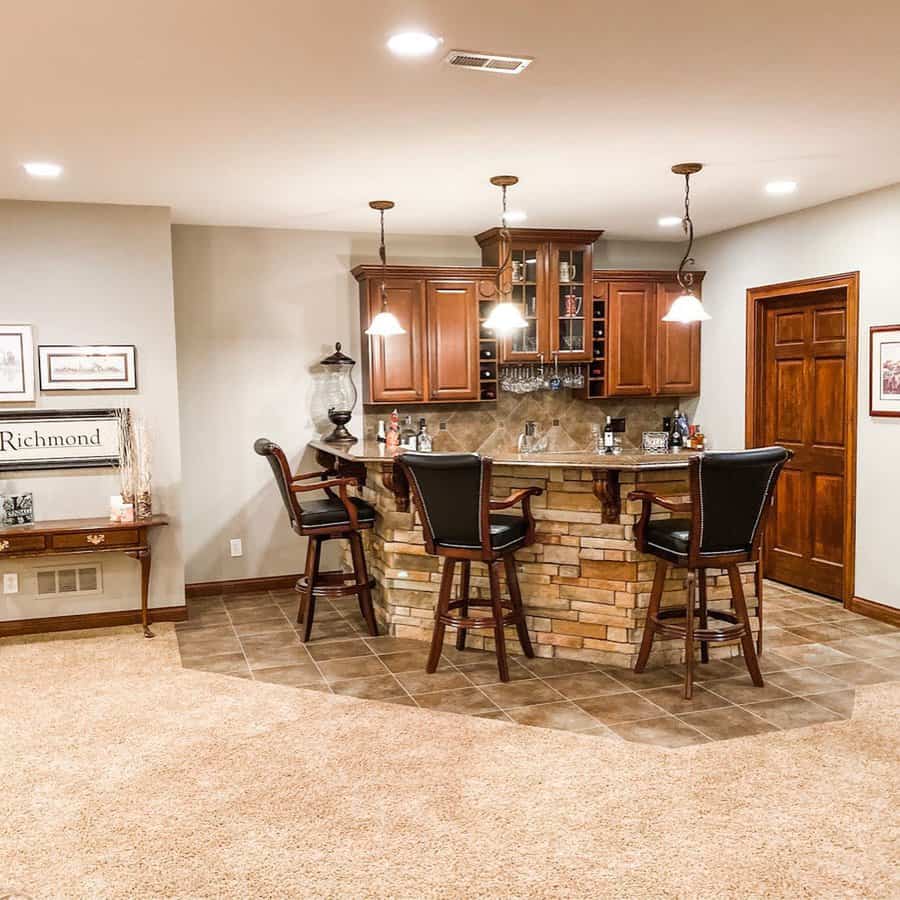 Cozy corner home bar with brick base and wood accents