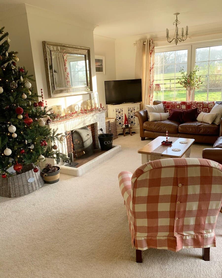 Cozy room with Christmas tree and fireplace