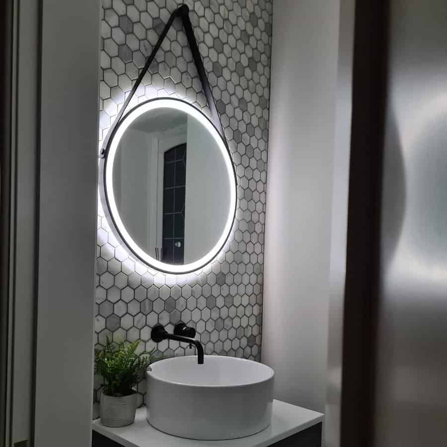 Bathroom sink with black fixtures