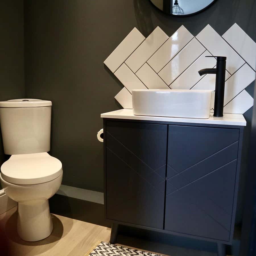 Bathroom sink with black fixtures