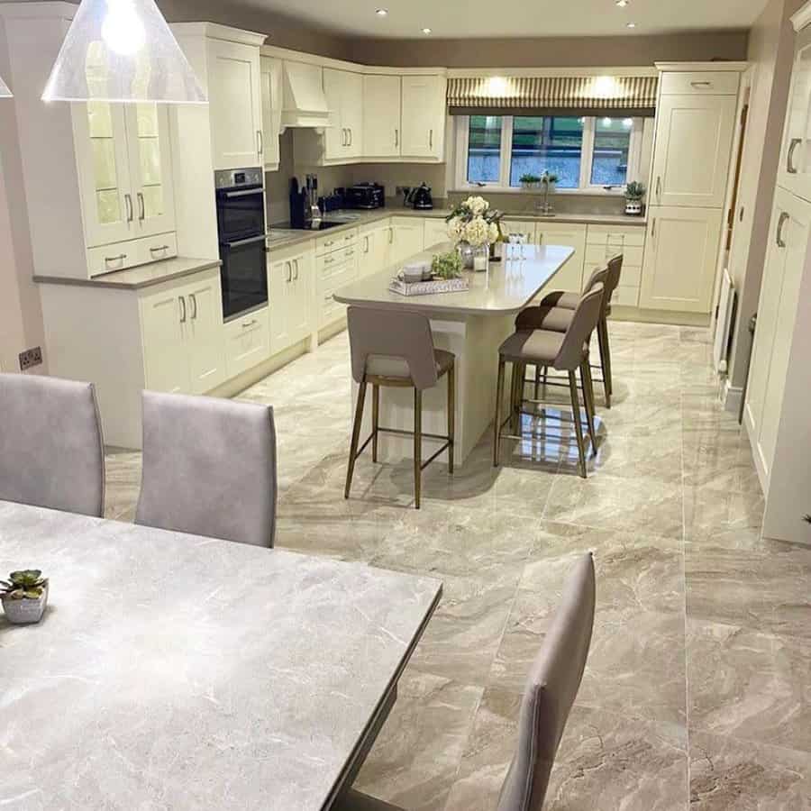 Spacious kitchen with island bar and elegant seating