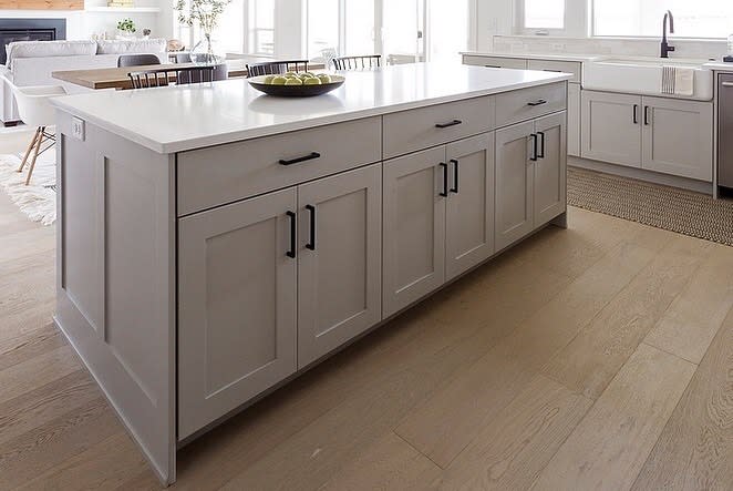 White kitchen with black fixtures 