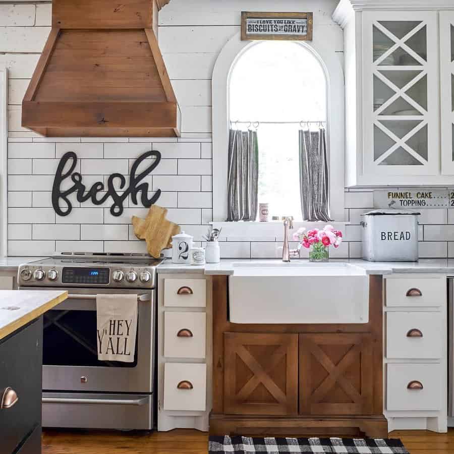 Farmhouse kitchen with wood flooring and cabinets