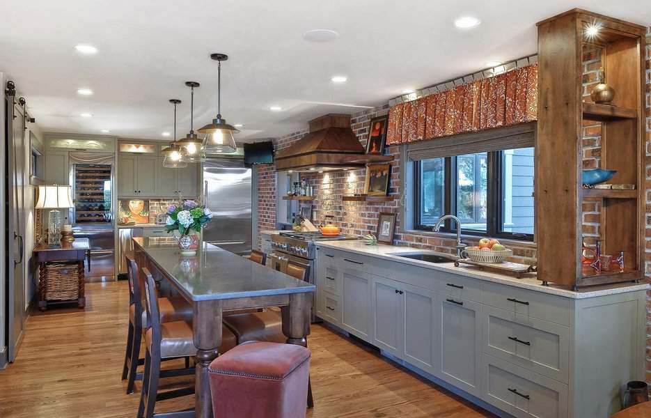 Rustic kitchen with exposed brick wall