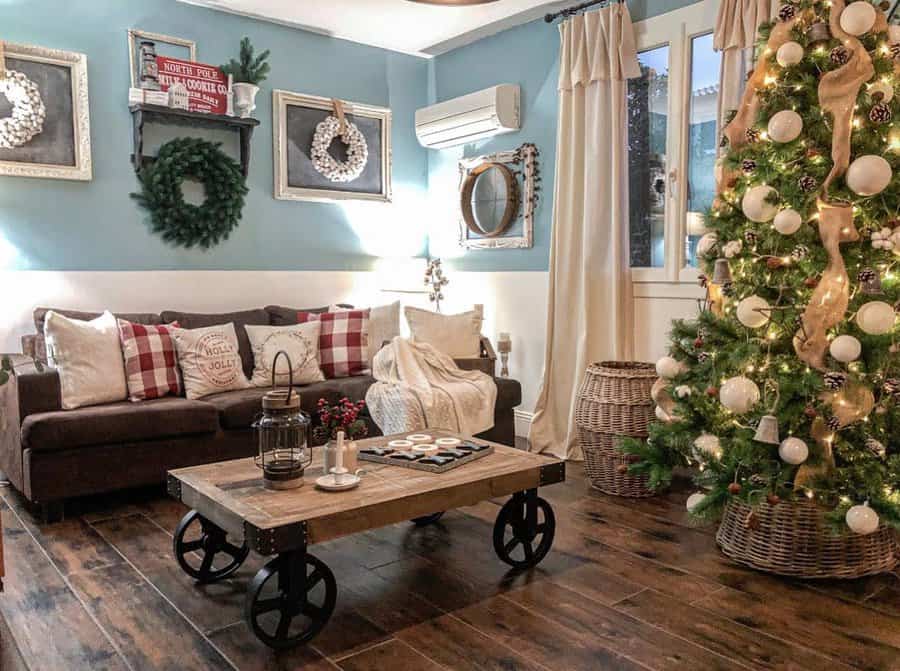 Festive living room with Christmas tree and rustic decor