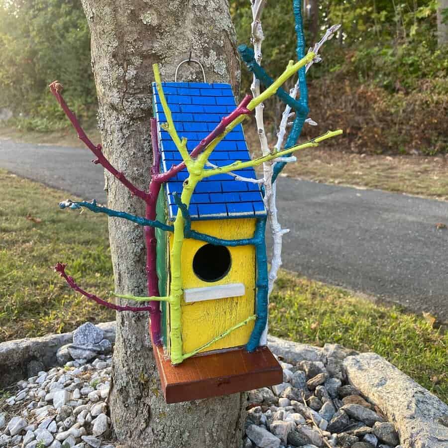 Creative birdhouse with branches