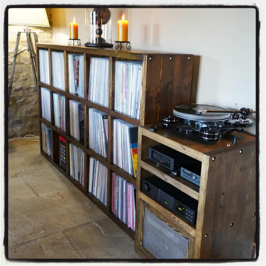 Rustic record shelf with turntable and candles