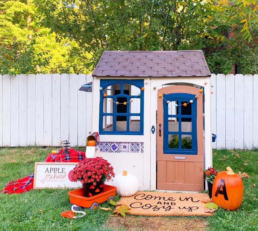 Autumn themed playhouse with festive decorations