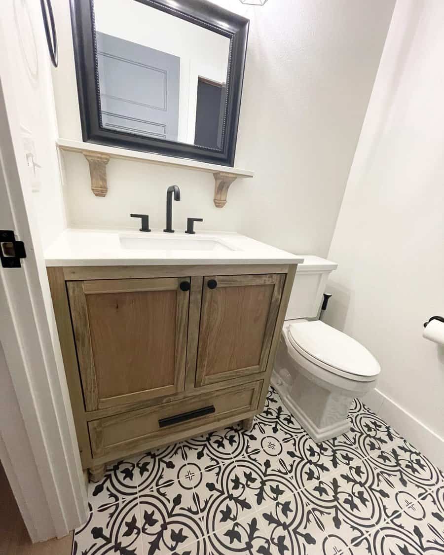 Modern bathroom with patterned floor and wooden vanity