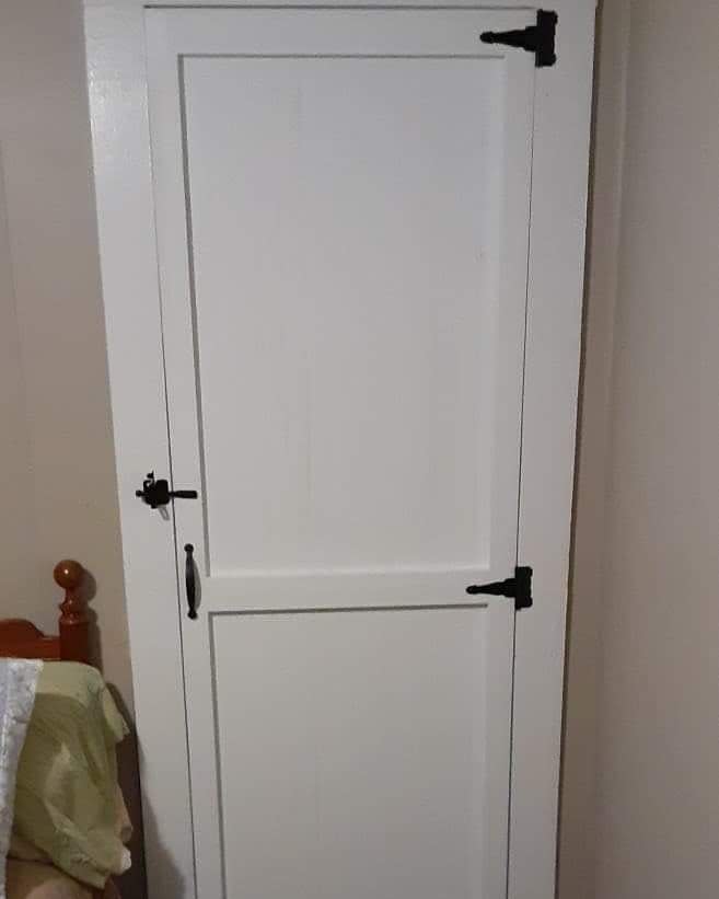 closet door with black metalware