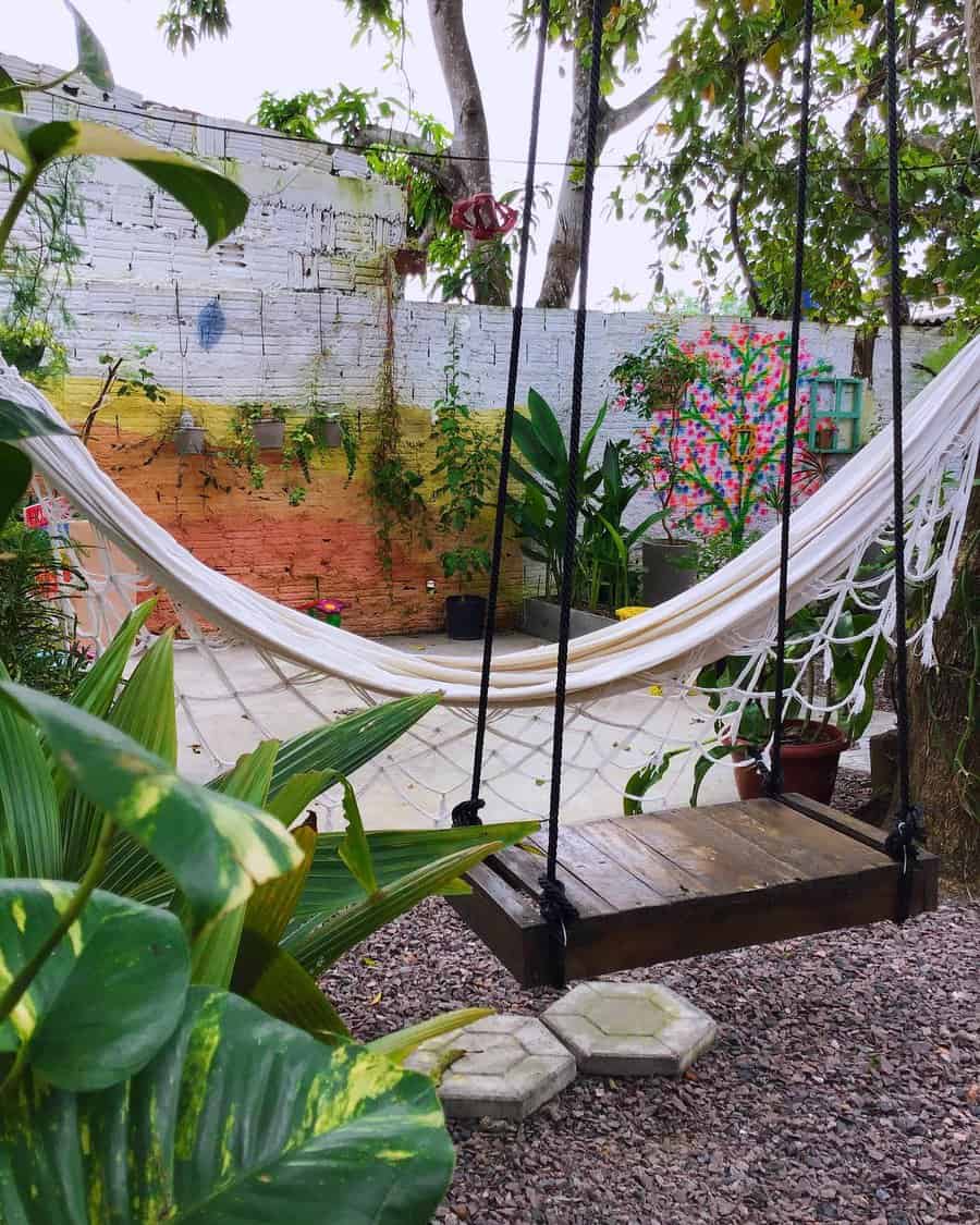 garden with hanging seating and hammock