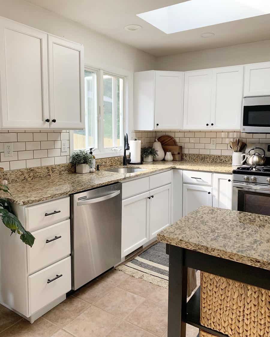 White cabinets with marble countertops