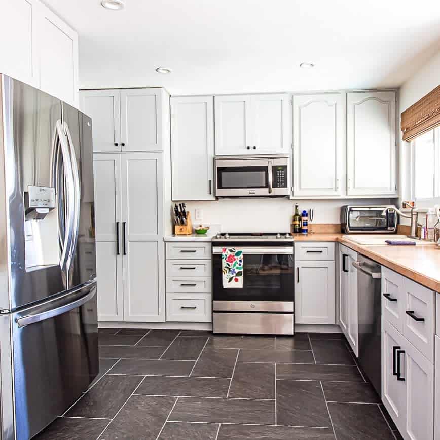 White cabinets with wood countertops