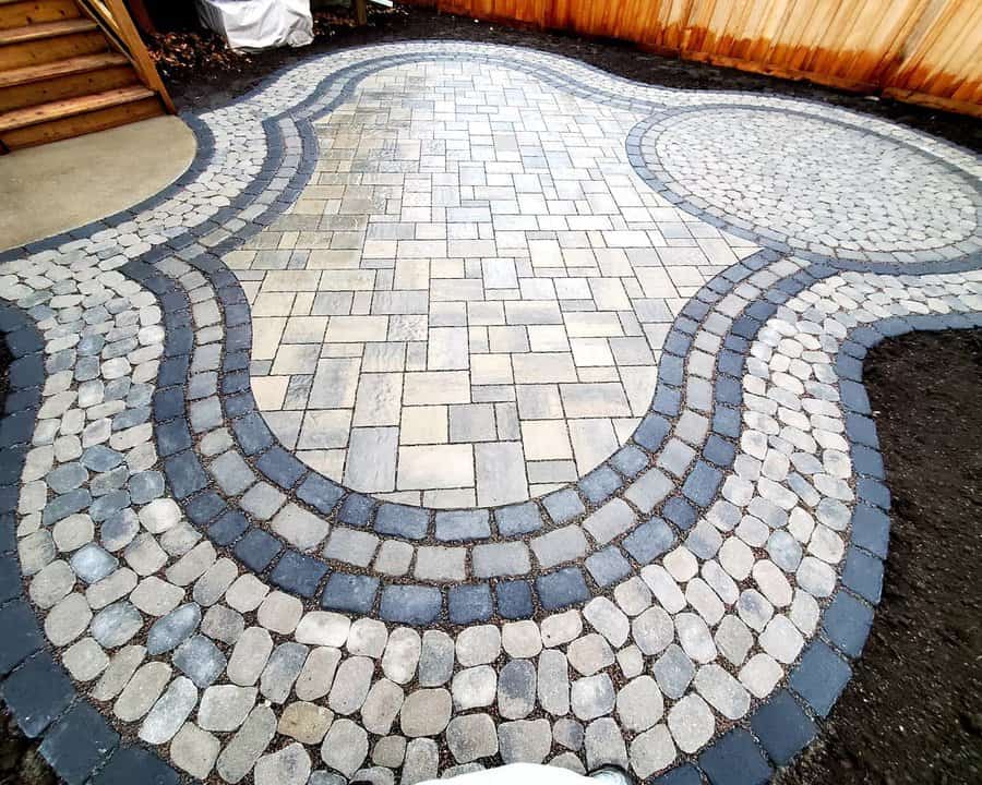 composite patio flooring with cobblestones, flagstones, and pavers