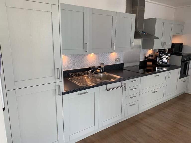 small kitchen with monochromatic palette