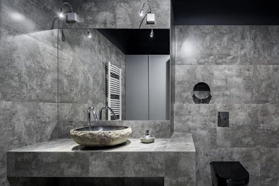 Industrial chic bathroom with stone basin