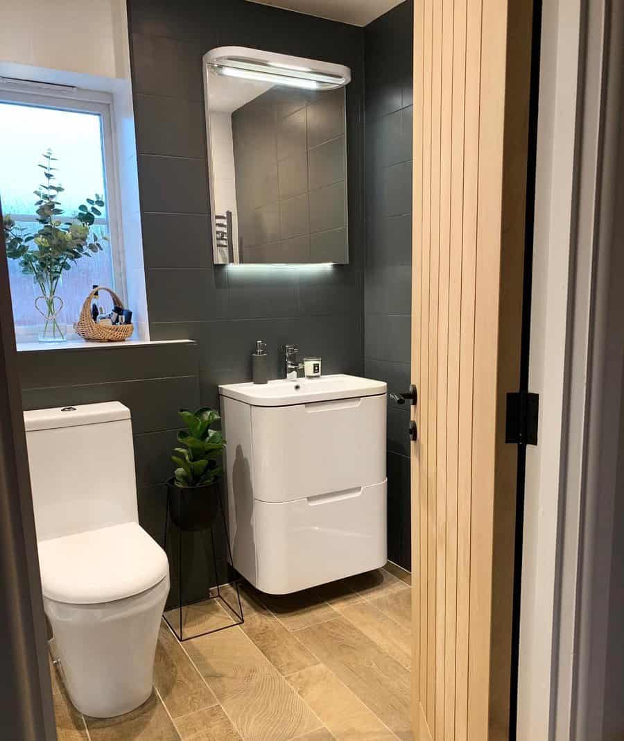 
Cozy bathroom with vanity and greenery