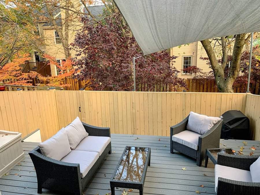 apartment patio with wicker furniture