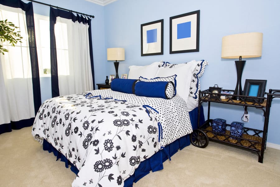 blue bedroom with printed bedding