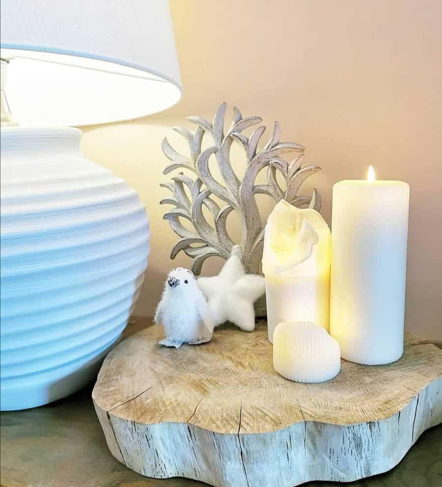 Coastal themed decor with candles and coral sculpture