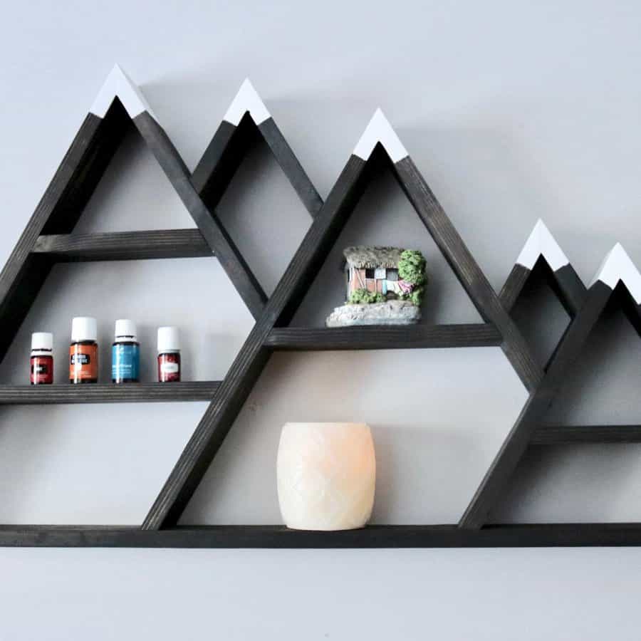 Mountain wood-framed wall shelf