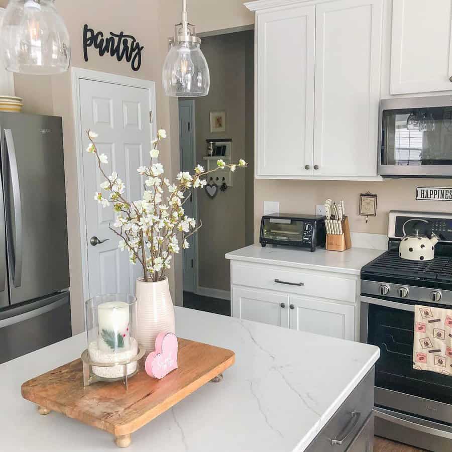 White kitchen with marble countertop