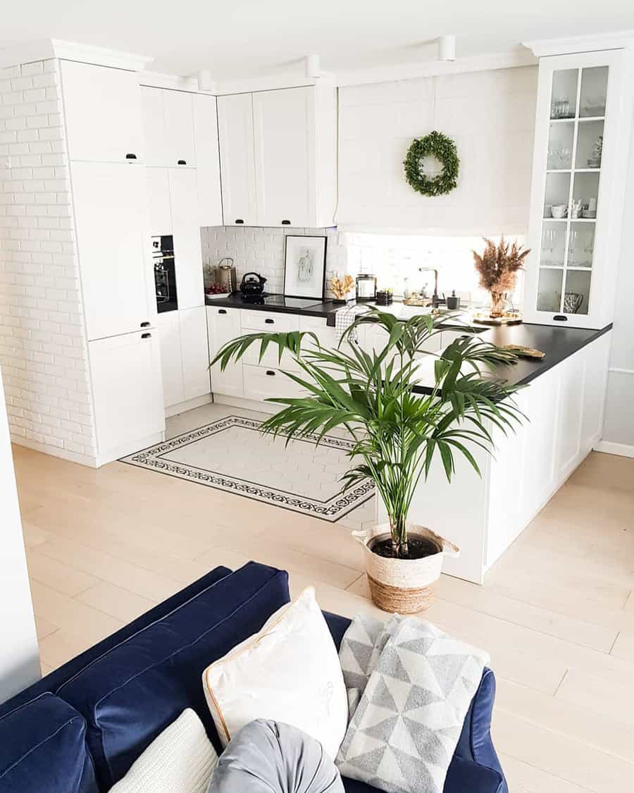 white kitchen with area rug